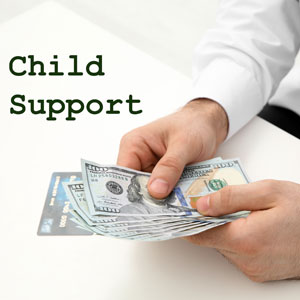 A man handing cash for child support. - The Law Office of Andy Nguyen, PLLC
