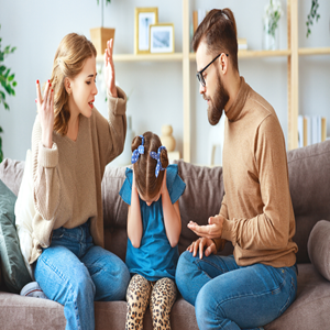 Parents arguing in front of their daughter during a child custody dispute in Renton, Washington